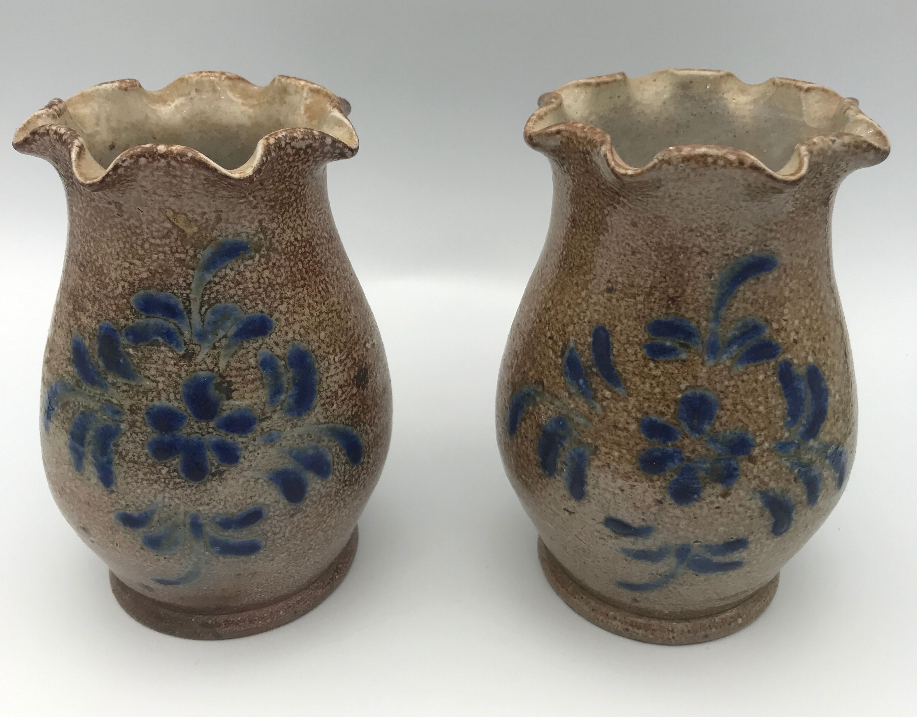 Pair of vintage pottery vases with floral decoration and glaçureau sel