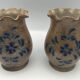 Pair of vintage pottery vases with floral decoration and glaçureau sel
