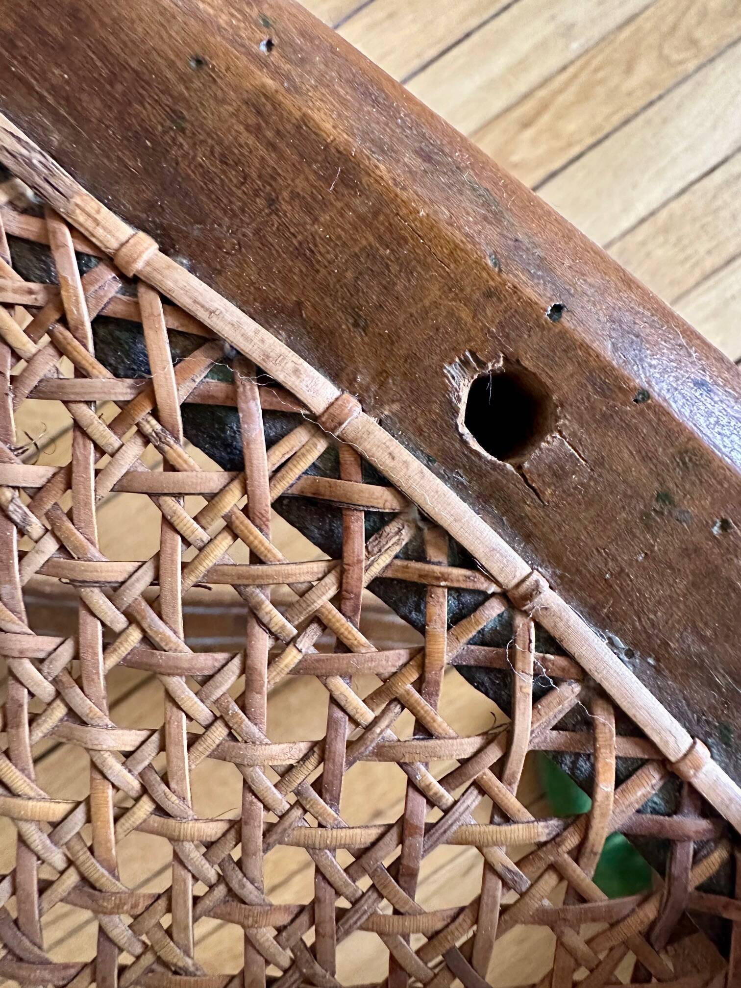 A pair of Regency armchairs with a stretcher.