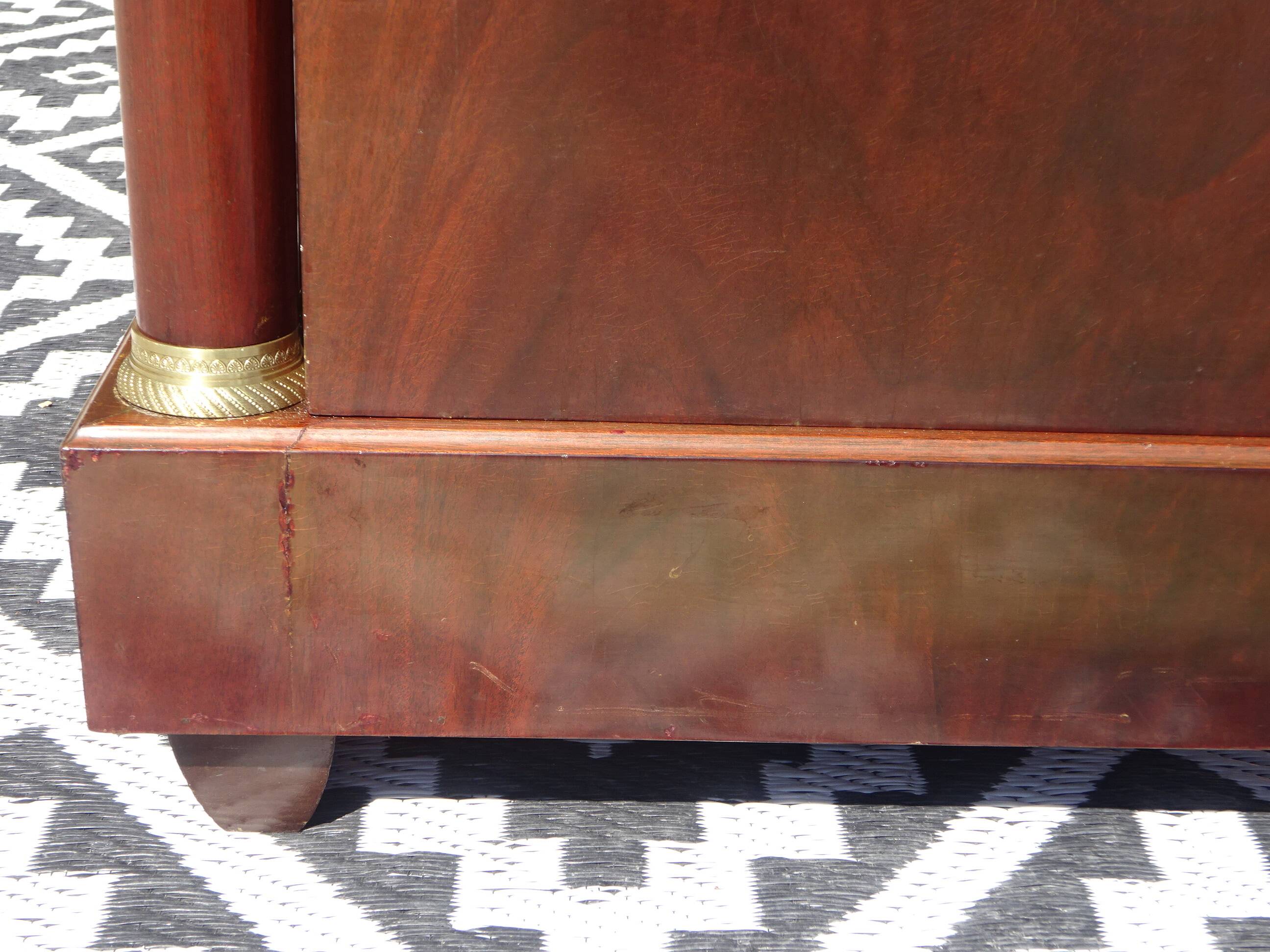 Flamed mahogany enfilade with sea green marble in Empire style.