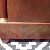 Flamed mahogany enfilade with sea green marble in Empire style.