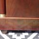 Flamed mahogany enfilade with sea green marble in Empire style.