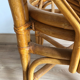 Chaise rotin dossier à forme de feuille