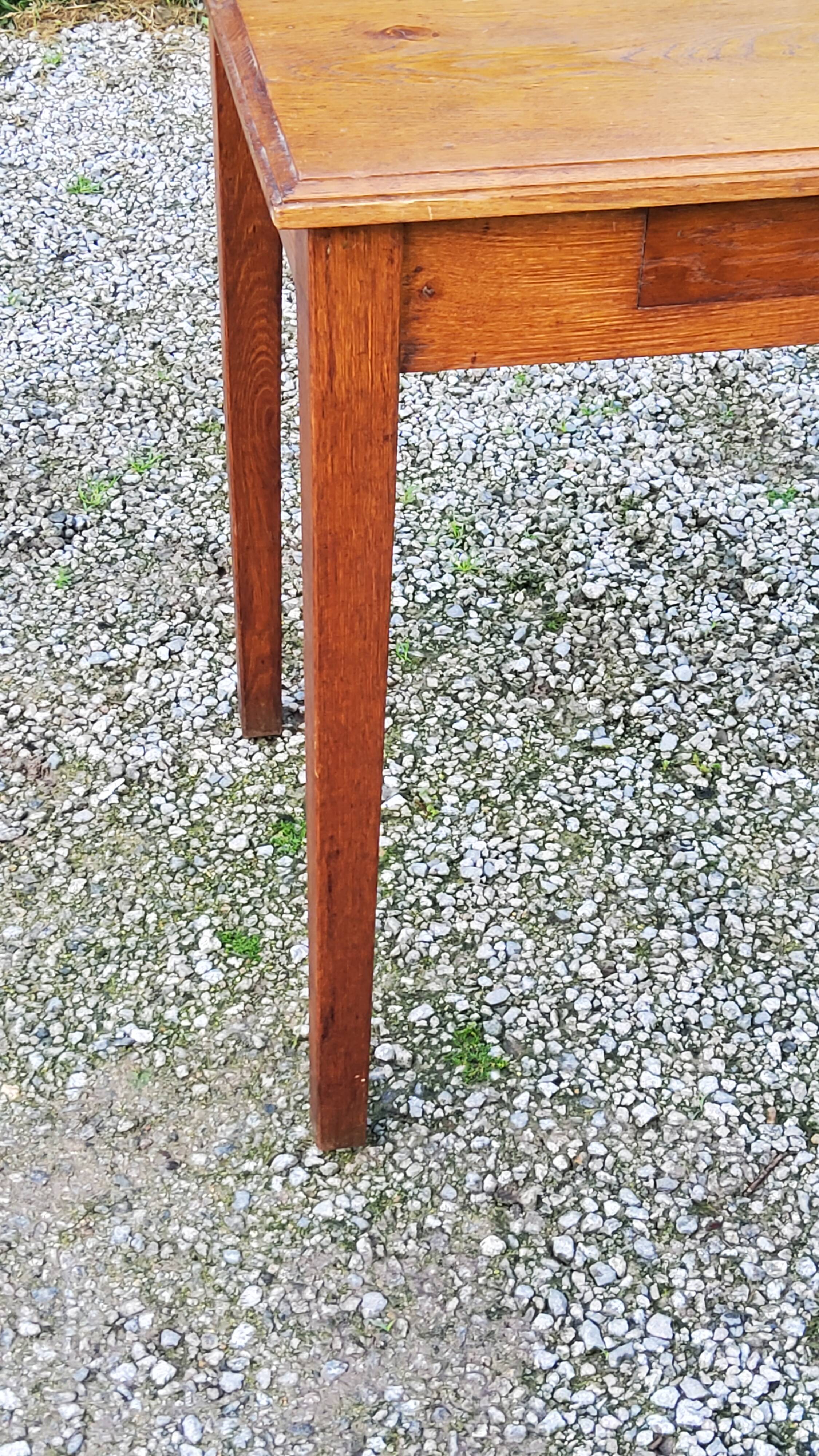 Oak writing table with spindle legs, early 20th century