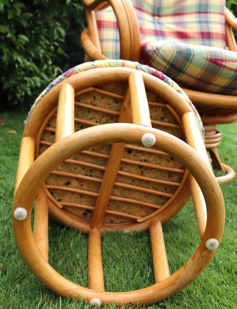 Swivel rattan armchair with matching ottoman