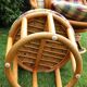 Swivel rattan armchair with matching ottoman