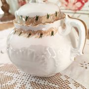 White porcelain sugar bowl decoration in relief and green and gold frieze