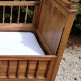 Old children's bed with retractable walnut bars