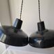 Duo of white and black enameled sheet metal pendants