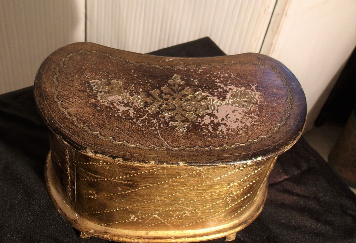 Jewelry box with gilded wooden drawers