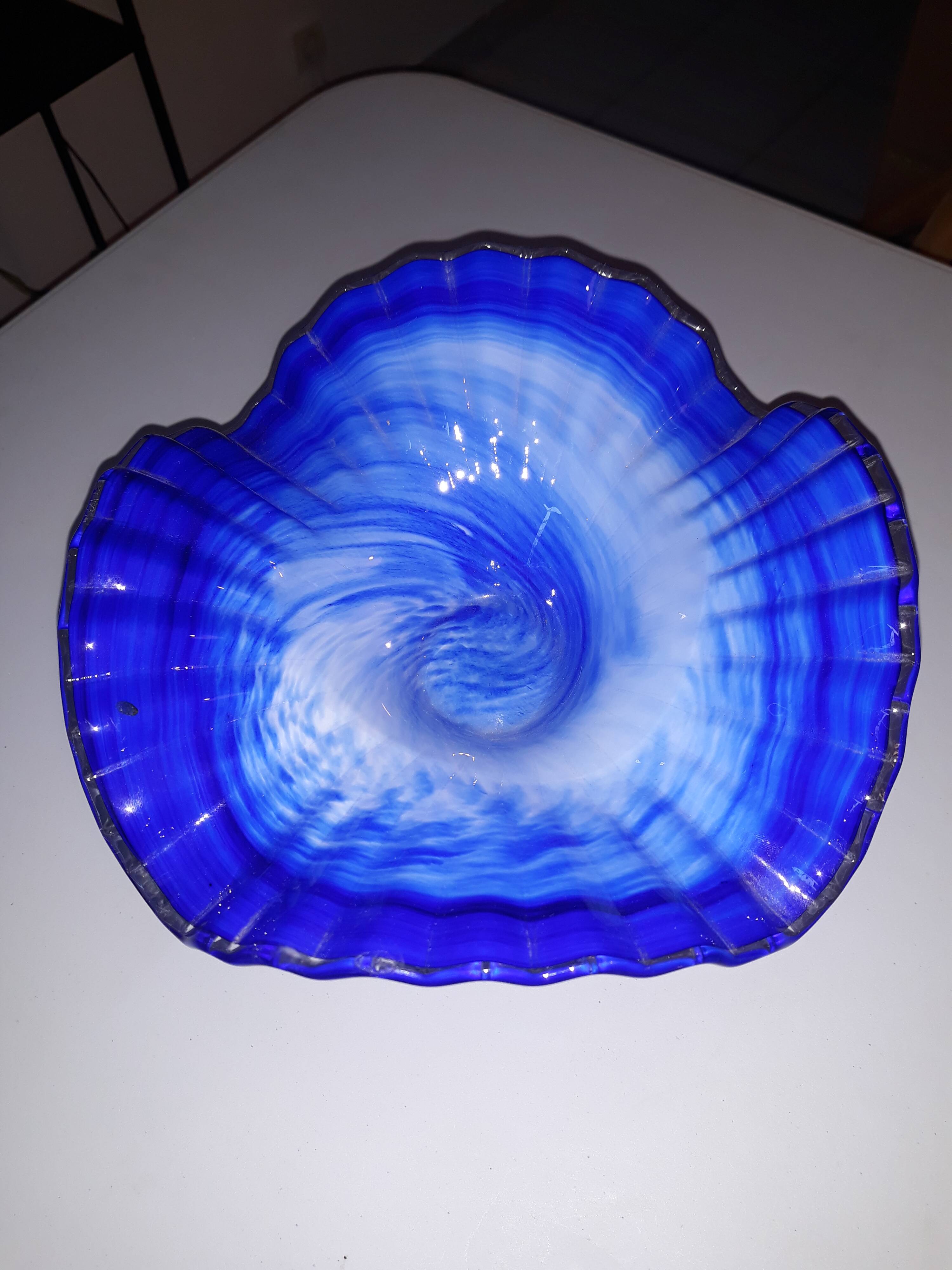 Glass and metal fruit bowl