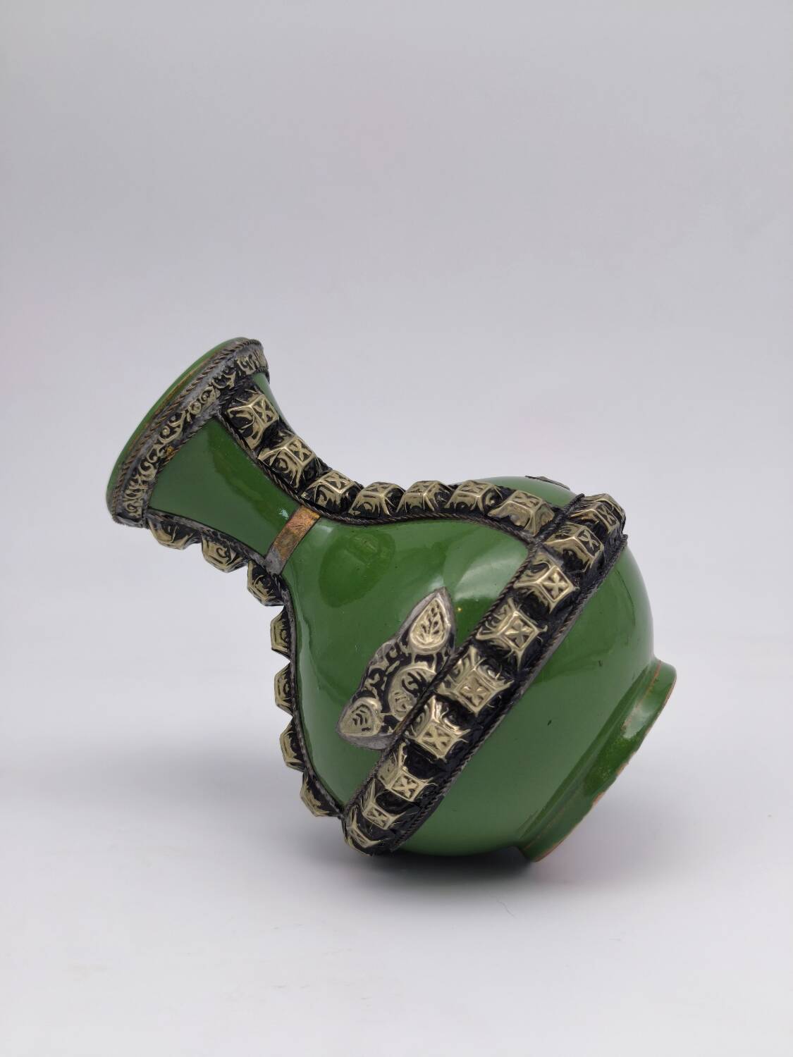 Antique green glazed ceramic vase with relief decoration – Europe