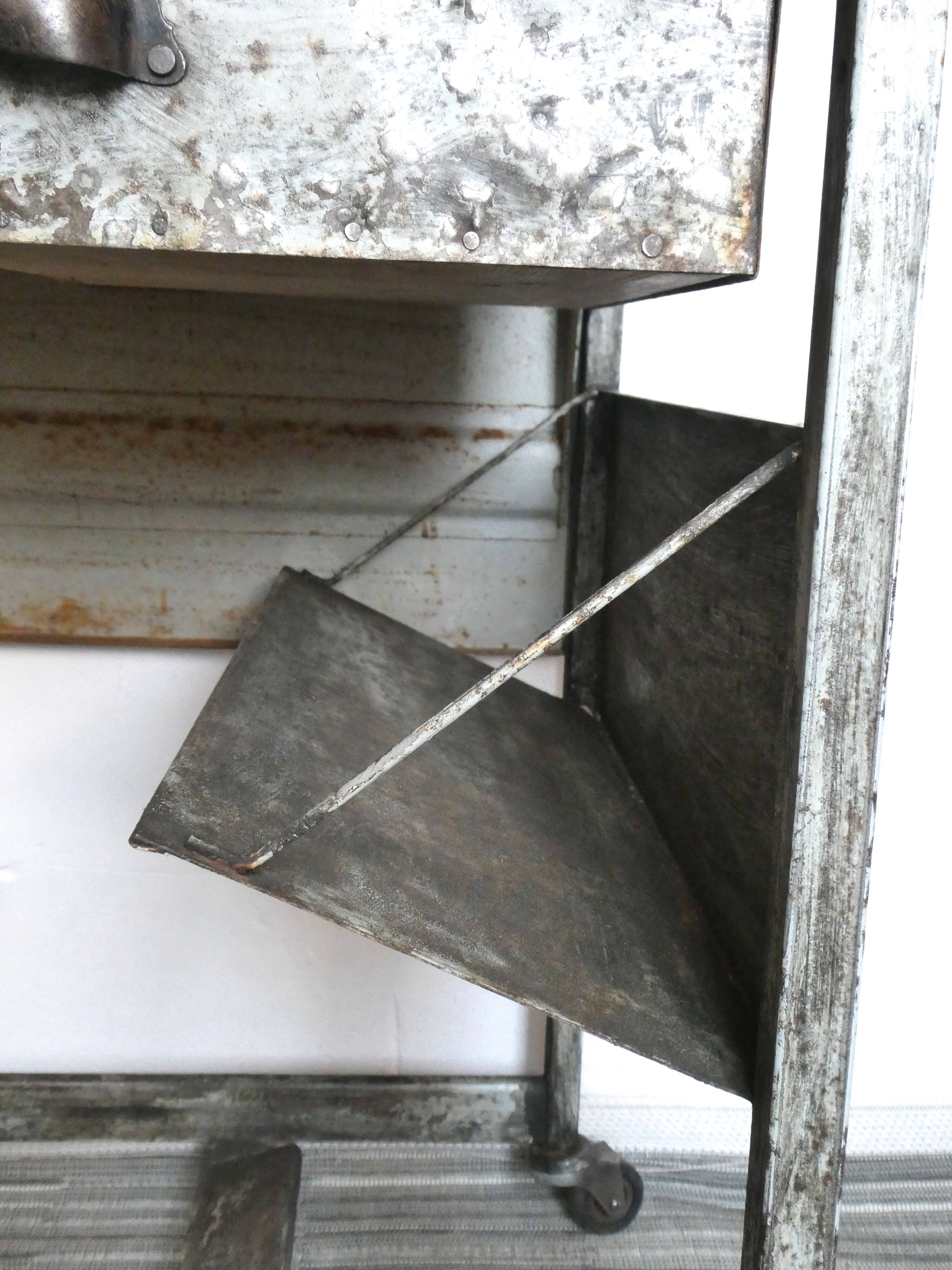 Industrial storage, workshop, in metal and wood, furniture on wheels