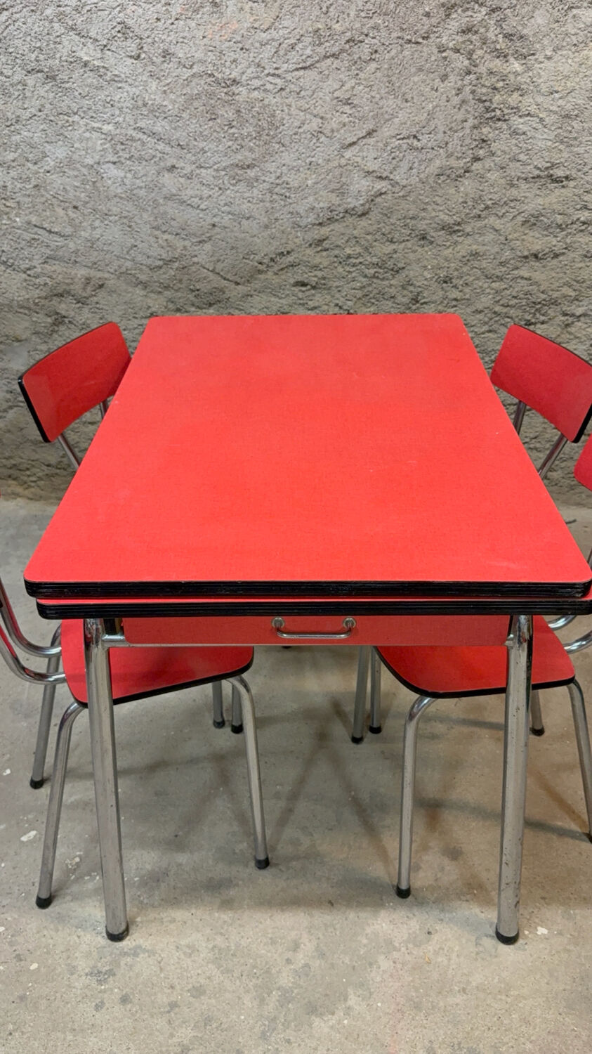 4 red Formica chairs with a 1970s table