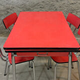 4 red Formica chairs with a 1970s table