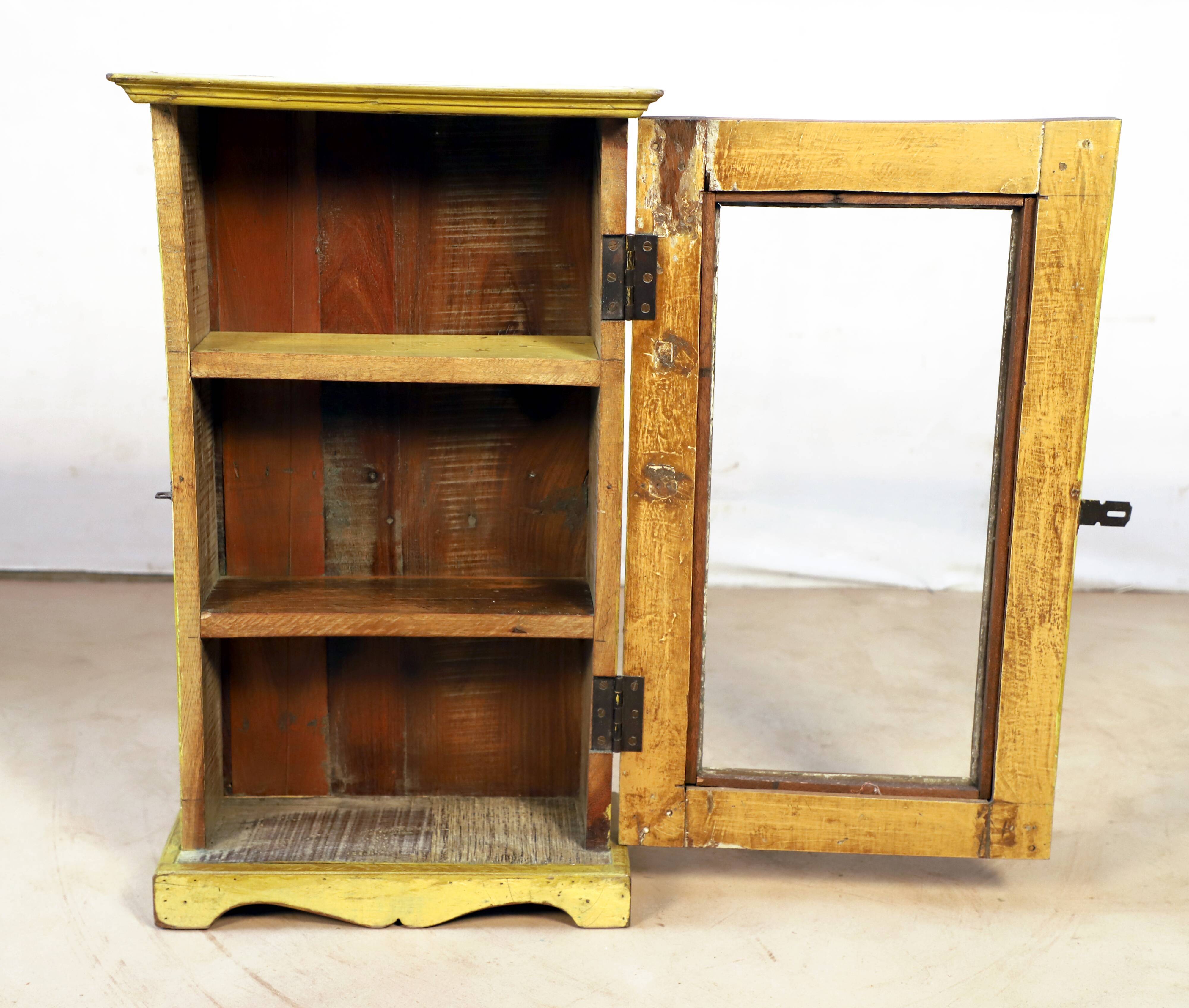 Burmese teak wall shelf with original yellow patina