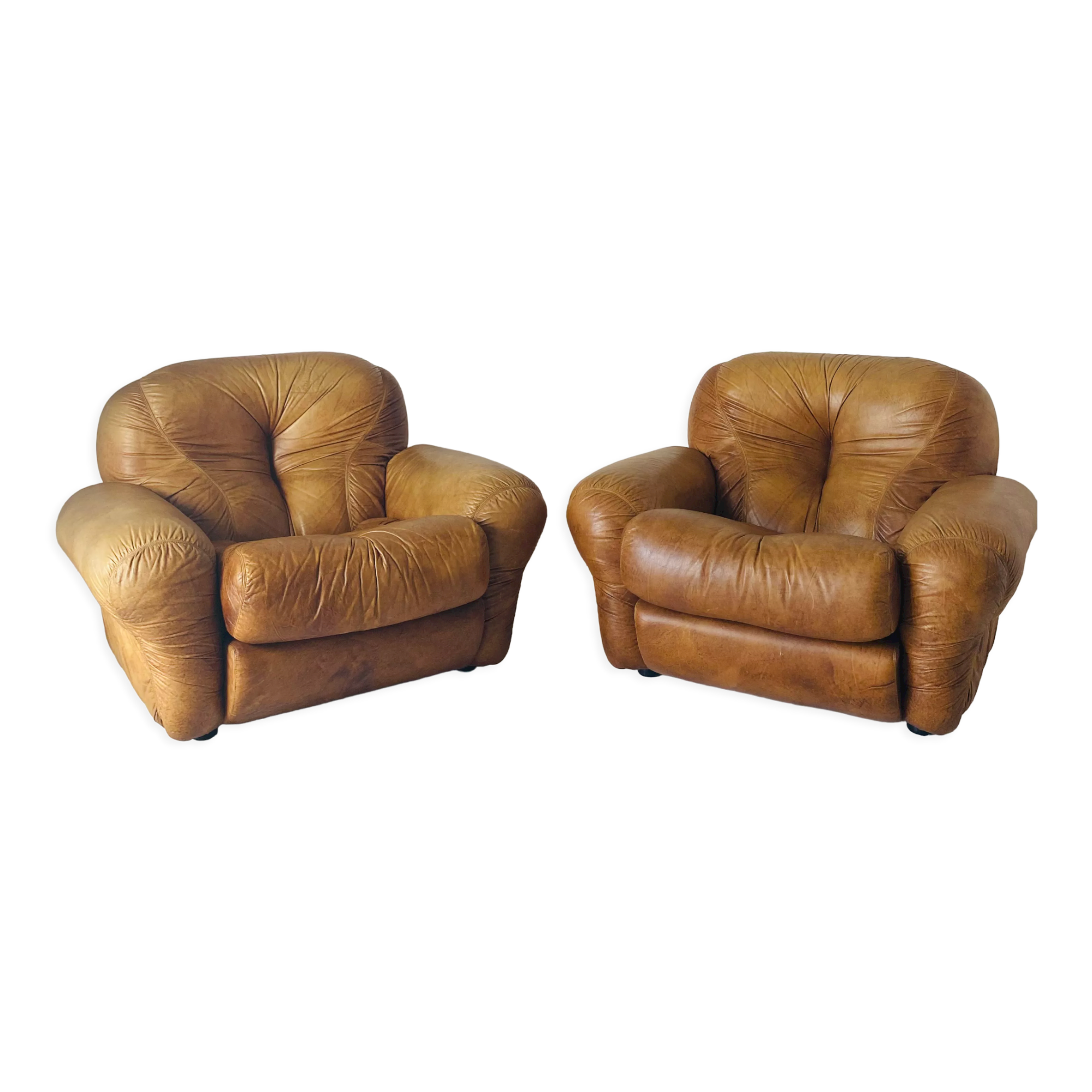 Pair of brown leather armchairs