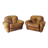 Paire de fauteuils en cuir marron