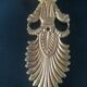 Paire d'appliques style Empire en bronze doré