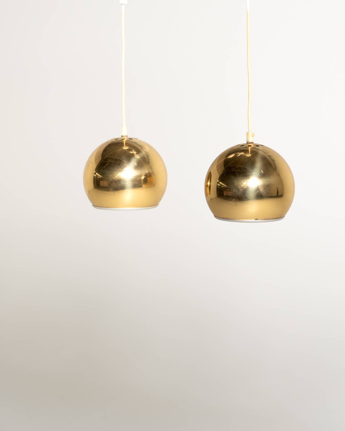 Pair of Swedish pendant lamps, 1960s/70s