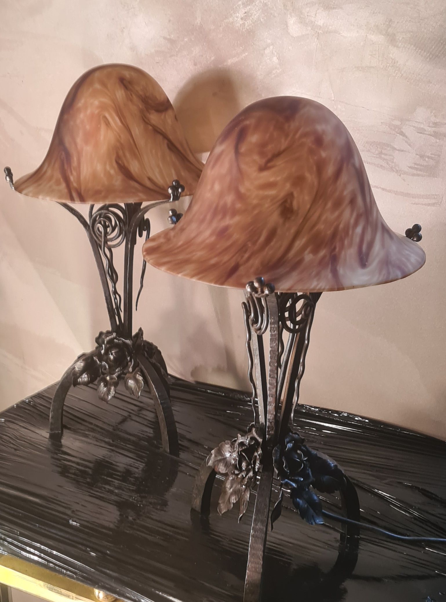 Pair of art nouveau wrought iron lamps with marbled glass paste 42x25