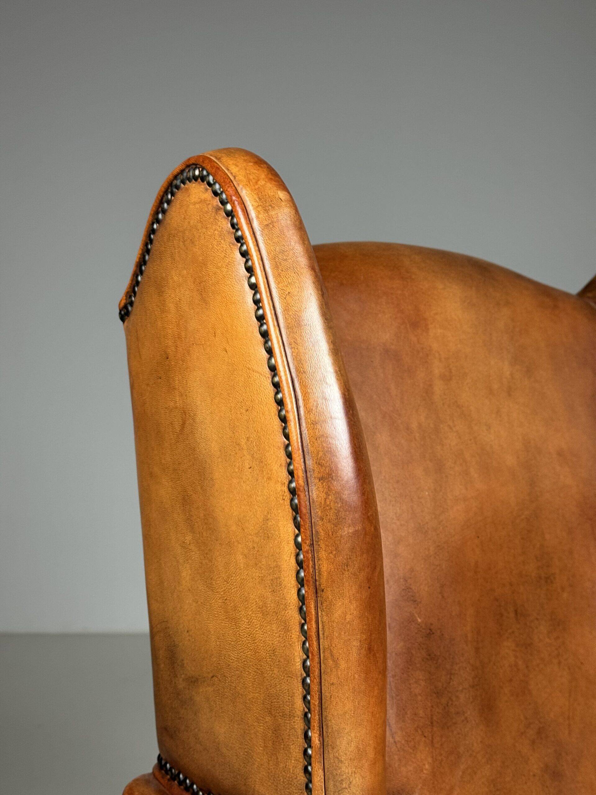 Set of 2 sheepskin club armchairs