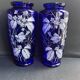 Pair of numbered white enamelled cobalt blue blown glass vases