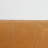 Modernist armchair in chromed metal and imitation leather, 50s/60s