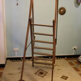 Old wooden stepladder with bodyguards
