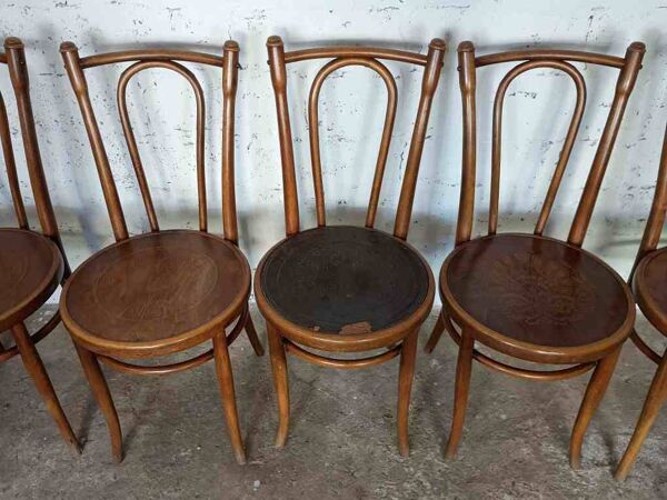 7 chaises bistrot pirogravées début XXème siècle Fischel Baumann Luterma