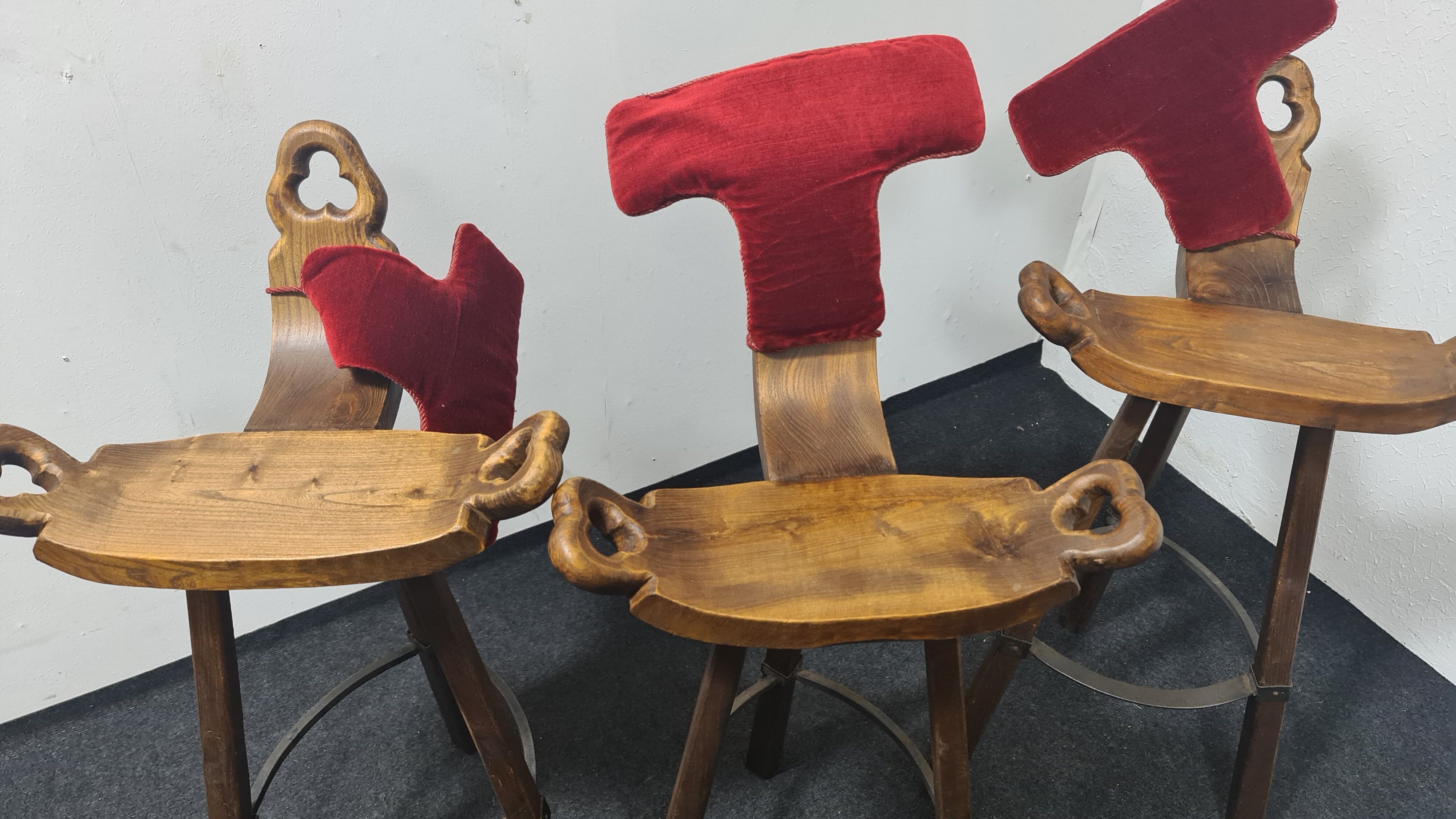 Three vintage Spanish bar stools