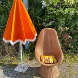 Rattan armchair and its cushion, 1960