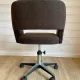 Vintage Mid-Century brown office chair with wheels from the 1970s.