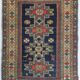 Handwoven Antique - Blue Ground Persian Rug with Bird-like Figures