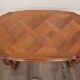 Louis XV style oval coffee table with glass top