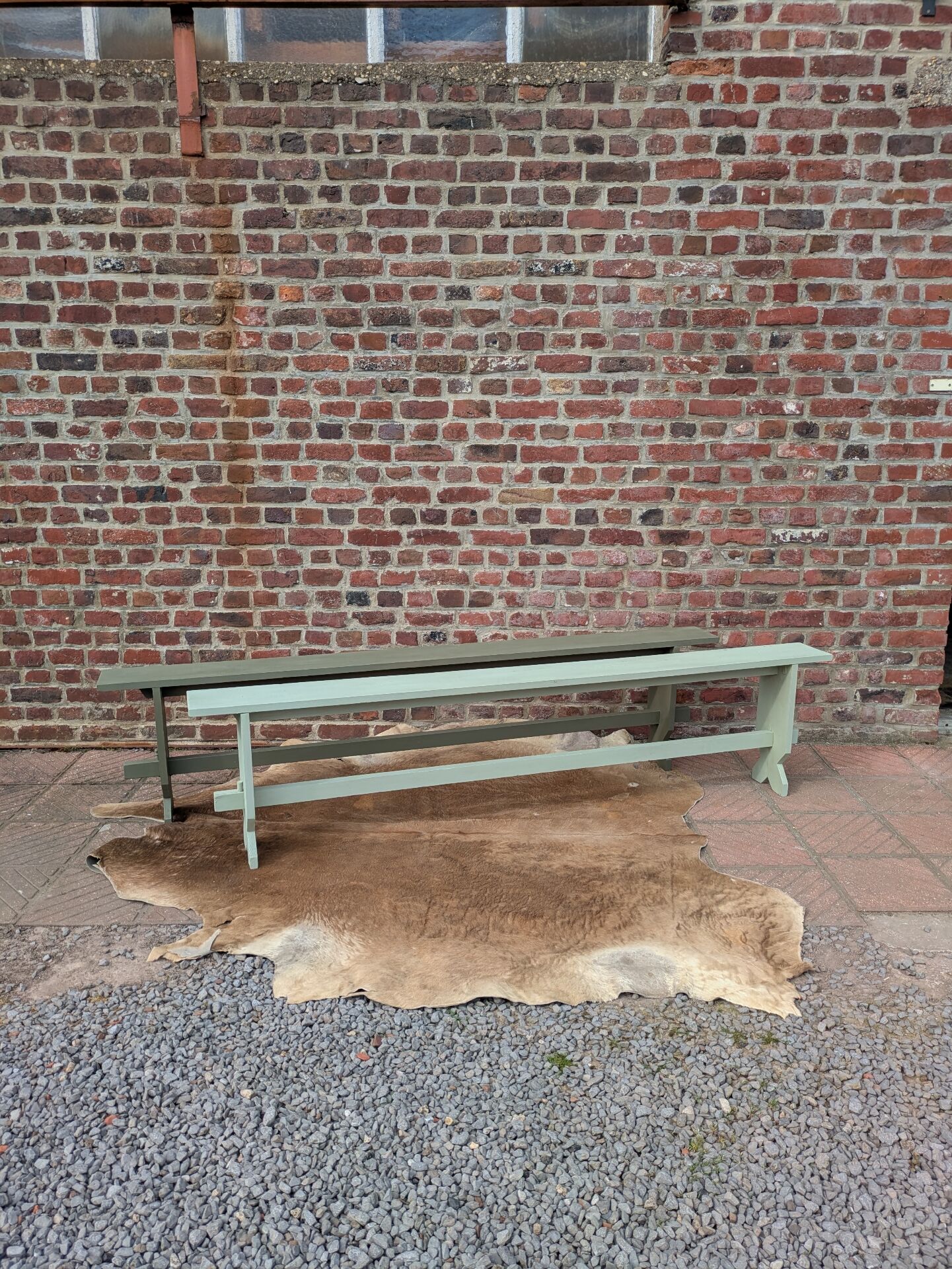 Pair of patinated benches