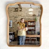 Art nouveau mirror, curved wooden frame and chiseled glass