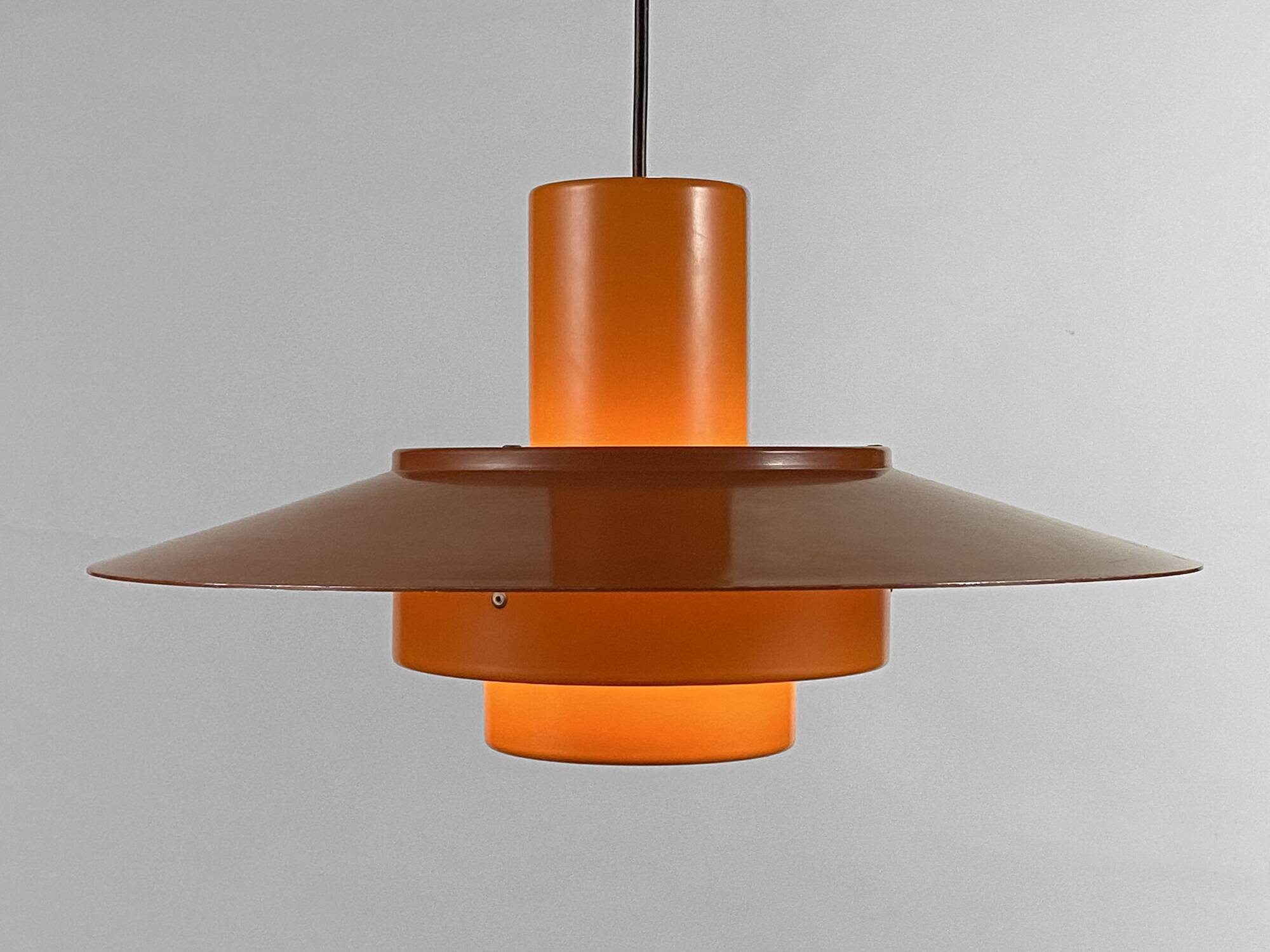 Pendant light "Falcon" two tone orange by Andreas Hansen for Fog & Mørup. Denmark 1960s.