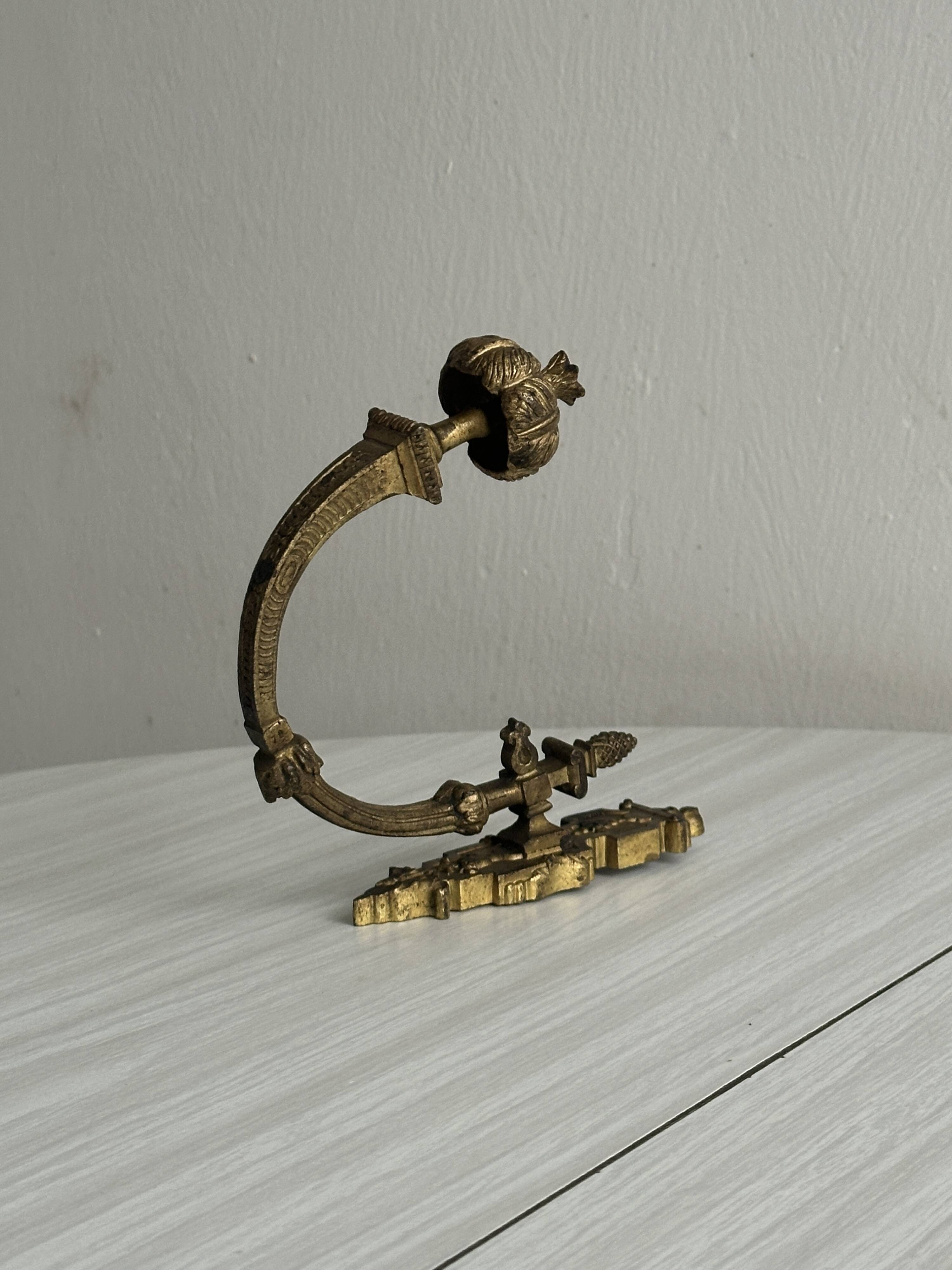 antique wall hook, gilded sculpted metal
