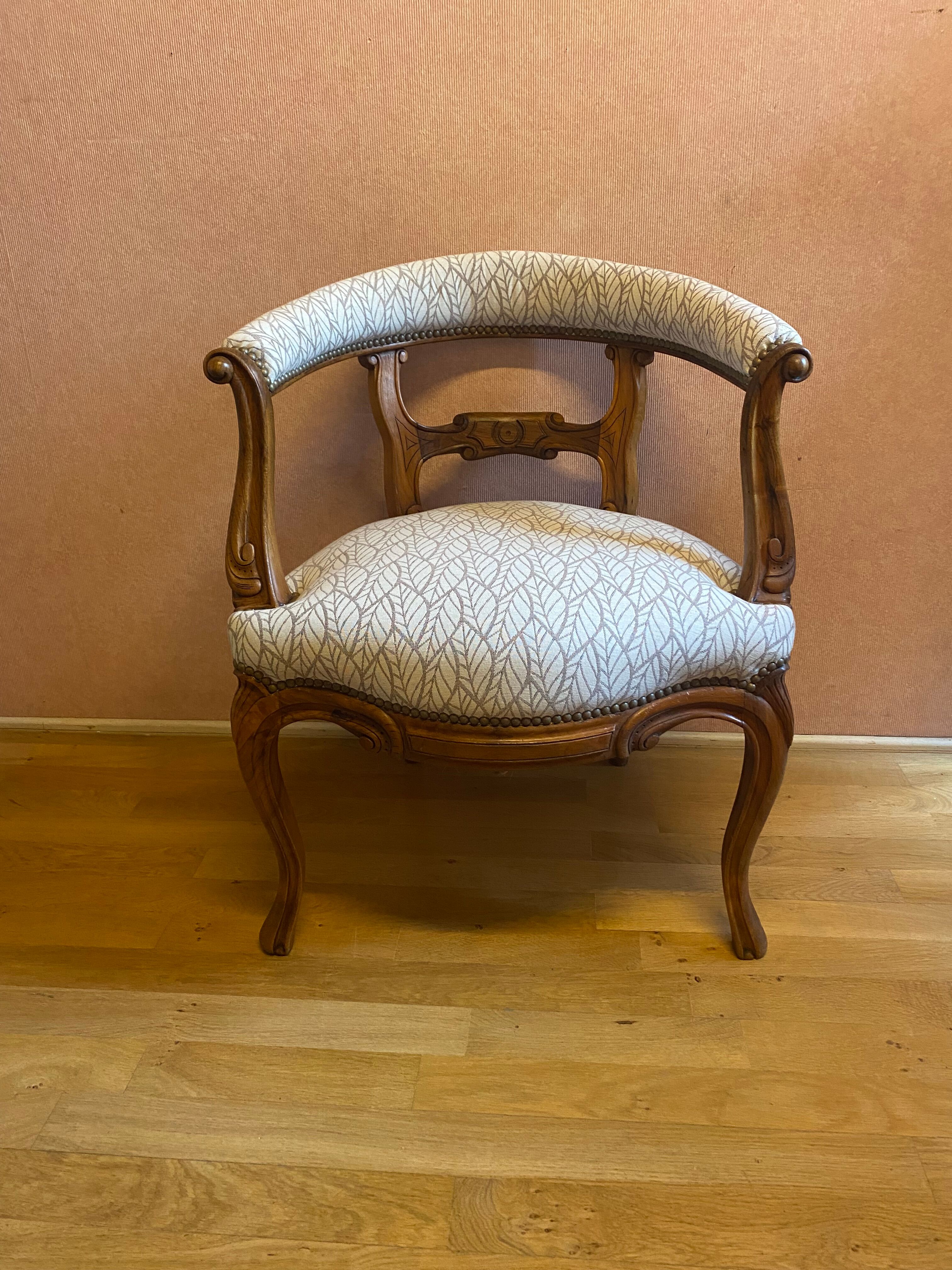 office armchair in walnut, nineteenth century, fully trimmed and reupholstered.