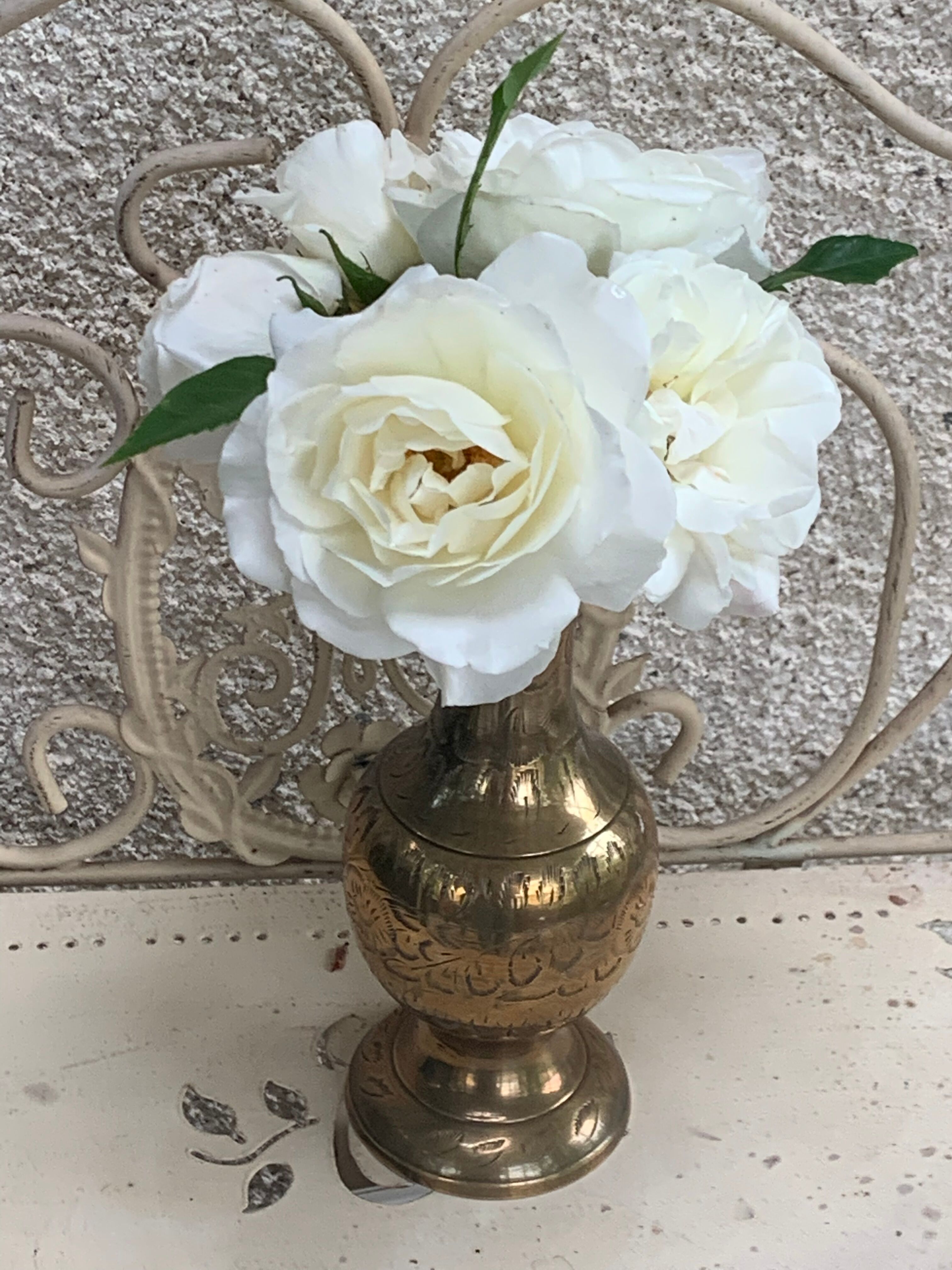 Golden brass vase chiseled vintage floral pattern