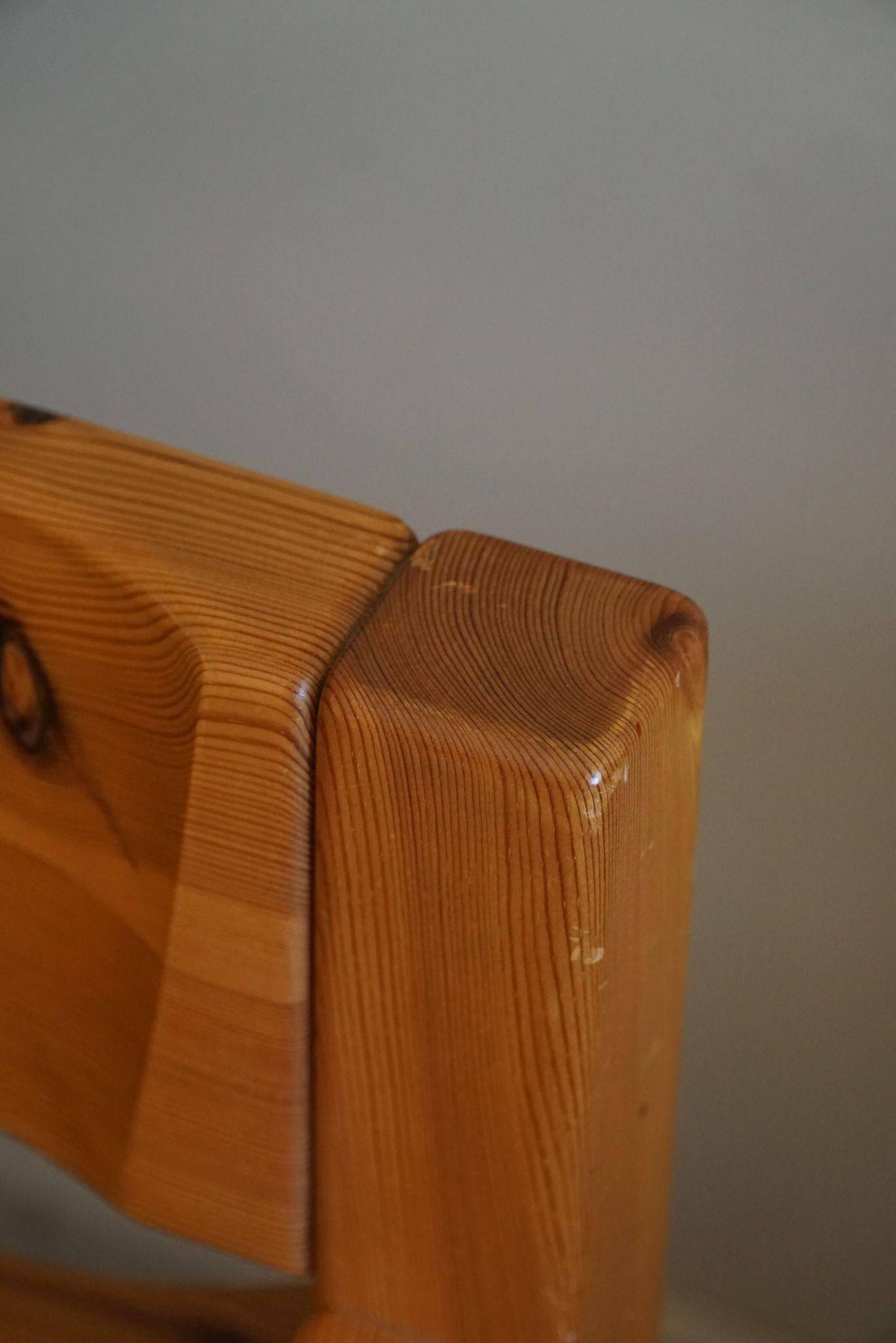 Tage Poulsen, a pair of brutalist chairs in pine and cord, Danish modern style, 1970s.