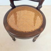 Antique Louis Philippe style chair in wood and caning.