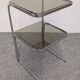 Chrome and smoked glass side table or end table, France circa 1970.