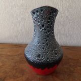 red and gray pitcher