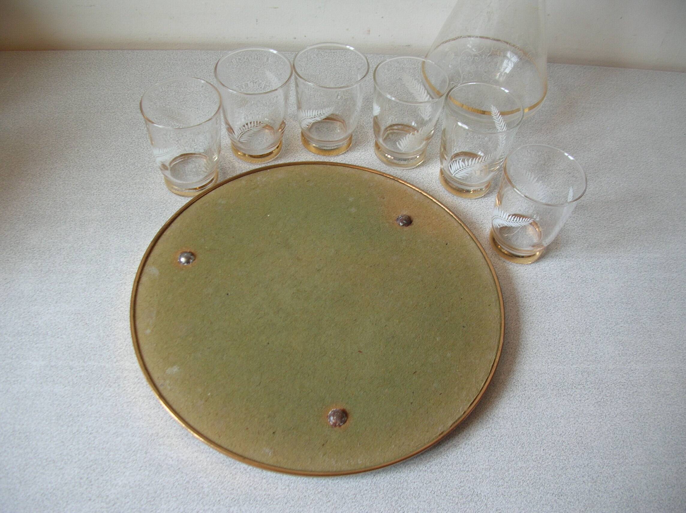 Old glass carafe liquor service with gilding vintage ice mirror tray