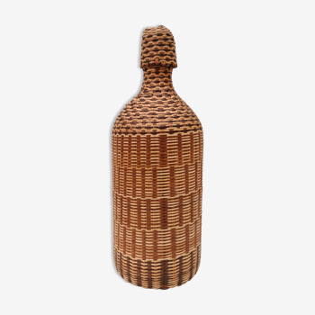 Vintage bottle in braided straw