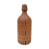 Vintage bottle in braided straw