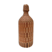 Vintage bottle in braided straw