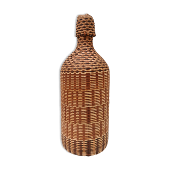 Vintage bottle in braided straw